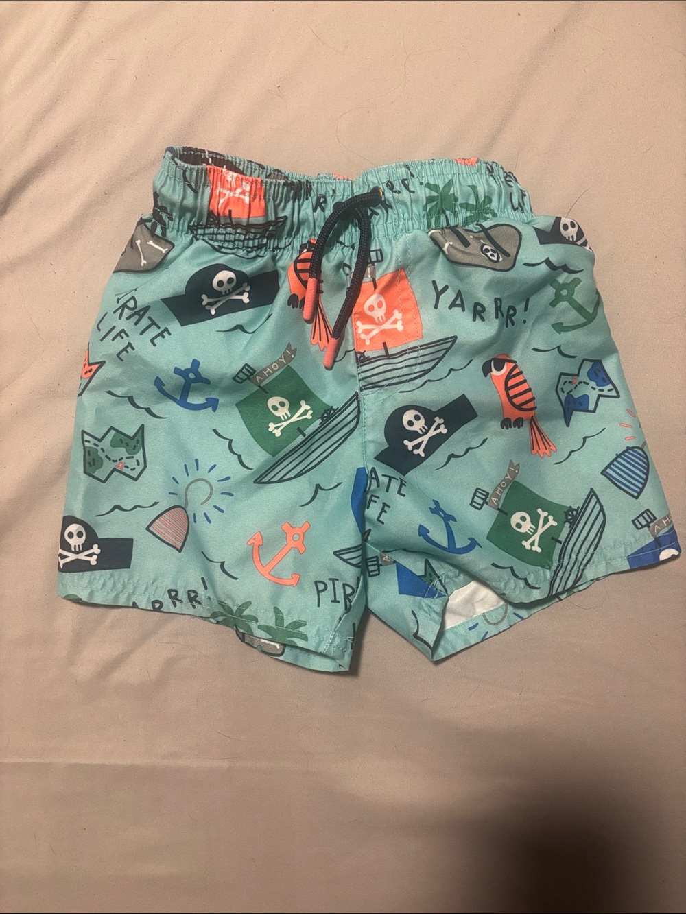 Cat & Jack Aqua Pirate Print Swim Trunks with Orange Accents